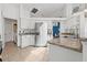 Modern kitchen with stainless steel appliances and granite countertops at 7162 Benson St, Englewood, FL 34224