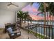 Outdoor balcony with water views and seating area at 158 Brightwater Dr # 1, Clearwater Beach, FL 33767