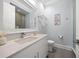 Modern bathroom with white vanity and walk-in shower at 158 Brightwater Dr # 1, Clearwater Beach, FL 33767