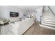 Open living room with comfortable seating and kitchen views at 158 Brightwater Dr # 1, Clearwater Beach, FL 33767
