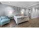 Bright bedroom with a queen-size bed and walk-in closet at 158 Brightwater Dr # 1, Clearwater Beach, FL 33767