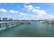 Wooden dock with access to the water, offering stunning waterfront views at 158 Brightwater Dr # 1, Clearwater Beach, FL 33767