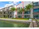 Modern three-story waterfront townhome with private balcony at 158 Brightwater Dr # 1, Clearwater Beach, FL 33767