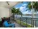 Relaxing patio with water views and outdoor furniture at 158 Brightwater Dr # 1, Clearwater Beach, FL 33767