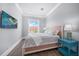 Bedroom with a king-size bed and waterfront view at 158 Brightwater Dr # 1, Clearwater Beach, FL 33767