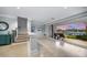 Bright interior with stairs and water view at 158 Brightwater Dr # 1, Clearwater Beach, FL 33767