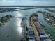 Breathtaking aerial view of waterfront homes and marina at 158 Brightwater Dr # 1, Clearwater Beach, FL 33767