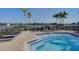 Relaxing heated pool with plenty of lounge chairs at 158 Brightwater Dr # 1, Clearwater Beach, FL 33767
