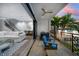 Relaxing patio with outdoor seating, offering stunning sunset views at 158 Brightwater Dr # 1, Clearwater Beach, FL 33767