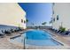 Refreshing community pool with plenty of space for relaxation at 158 Brightwater Dr # 1, Clearwater Beach, FL 33767
