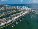 Aerial view of waterfront community with boats and beautiful water at 158 Brightwater Dr # 1, Clearwater Beach, FL 33767
