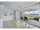 Light-filled room with sliding doors to patio at 158 Brightwater Dr # 1, Clearwater Beach, FL 33767