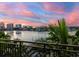 Stunning sunset over the waterfront with boats at 158 Brightwater Dr # 1, Clearwater Beach, FL 33767