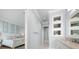 Spa-like bathroom with a double vanity and a large walk-in shower at 158 Brightwater Dr # 1, Clearwater Beach, FL 33767