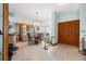 Bright dining area with wood furniture and a glass-top table at 366 6Th N Ave, Tierra Verde, FL 33715