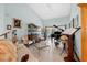 Spacious living area with a grand piano, comfortable seating, and plenty of natural light at 366 6Th N Ave, Tierra Verde, FL 33715