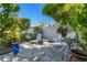 Peaceful patio with lounge chairs, perfect for relaxing at 366 6Th N Ave, Tierra Verde, FL 33715