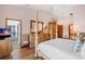 Spacious main bedroom with a post bed and ample closet space at 366 6Th N Ave, Tierra Verde, FL 33715