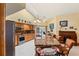 Spacious kitchen boasts granite countertops and wood cabinetry at 366 6Th N Ave, Tierra Verde, FL 33715