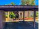 Covered carport with parking for two cars at 7200 Ulmerton Rd # F2, Largo, FL 33771