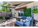 Private backyard oasis with patio furniture and fire pit at 7200 Ulmerton Rd # F2, Largo, FL 33771