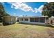 Backyard with shed and screened porch at 5575 6Th N Ave, St Petersburg, FL 33710