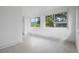 Bright bedroom with multiple windows and light flooring at 5575 6Th N Ave, St Petersburg, FL 33710