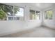 Bright bedroom with multiple windows and light flooring at 5575 6Th N Ave, St Petersburg, FL 33710