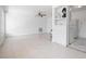 Spacious living room with ceiling fan and tile floor at 5575 6Th N Ave, St Petersburg, FL 33710