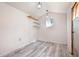 Bright workshop with laminate floors and shelving at 5575 6Th N Ave, St Petersburg, FL 33710