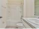 Clean bathroom with a shower/tub combo, vanity, and tile flooring at 5552 Logan Cave Ave, Wimauma, FL 33598