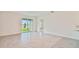 Dining area with sliding glass doors and view of the backyard at 5552 Logan Cave Ave, Wimauma, FL 33598
