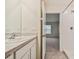 Clean bathroom with a shower and vanity at 5552 Logan Cave Ave, Wimauma, FL 33598