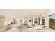 Open-concept living and kitchen area with modern finishes at 5701 Bowen Daniel Dr. # 1 Villa, Tampa, FL 33616