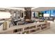 Upscale lounge with fireplace and bar area at 5701 Bowen Daniel Dr. # 1 Villa, Tampa, FL 33616