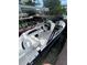 This boat has a sleek black and white design and lots of comfortable seating at 440 64Th Ave, St Pete Beach, FL 33706