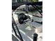 Boat interior featuring white upholstery, captain's chair and black accents at 440 64Th Ave, St Pete Beach, FL 33706