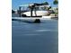 Dog's eye view of a boat lift with a boat at 440 64Th Ave, St Pete Beach, FL 33706