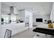 Sleek kitchen features modern appliances, ample counter space, and an open design with natural light at 440 64Th Ave, St Pete Beach, FL 33706