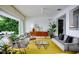 Bright living room offers modern furniture, stylish decor, and great natural light at 440 64Th Ave, St Pete Beach, FL 33706