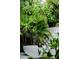 Zen outdoor bathroom with tropical plants and a soaking tub, creating a private tropical retreat at 440 64Th Ave, St Pete Beach, FL 33706