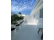 A well-maintained patio, featuring potted greenery and modern privacy, perfect for outdoor relaxation and enjoyment at 440 64Th Ave, St Pete Beach, FL 33706