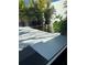Exterior shot of tranquil water feature surrounded by potted plants at 440 64Th Ave, St Pete Beach, FL 33706