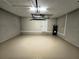 Attached garage with interior access to the home and extra storage space at 1495 Robwood Ter, North Port, FL 34288
