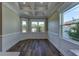 Bright dining room with hardwood floors and large windows offering natural light at 241 5Th N Ave, Safety Harbor, FL 34695