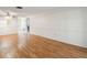 Bright living room featuring hardwood floors and neutral walls at 4244 Tamargo Dr, New Port Richey, FL 34652