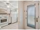 Efficient kitchen with white appliances and ample cabinet space at 4244 Tamargo Dr, New Port Richey, FL 34652