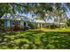 Exterior of the home with walkway and landscaping at 4244 Tamargo Dr, New Port Richey, FL 34652