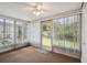 Sunroom with window blinds and carpet flooring at 4244 Tamargo Dr, New Port Richey, FL 34652