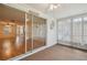 Relaxing sunroom with glass doors and carpet flooring at 4244 Tamargo Dr, New Port Richey, FL 34652